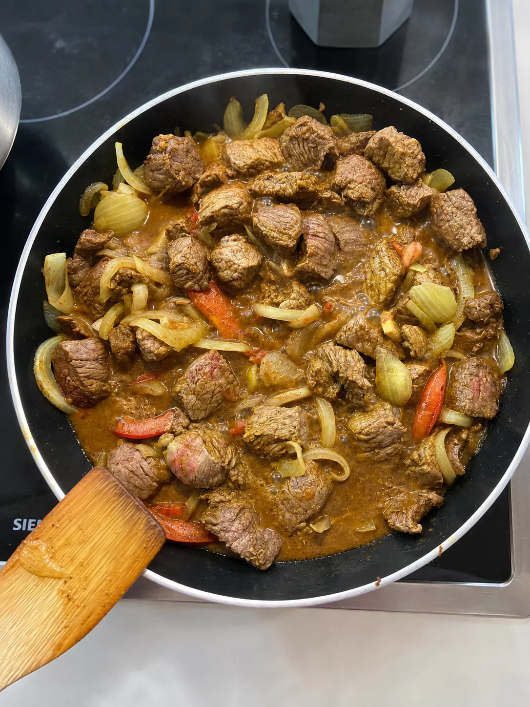 Fried the meet and onions ( optional: tomatos)